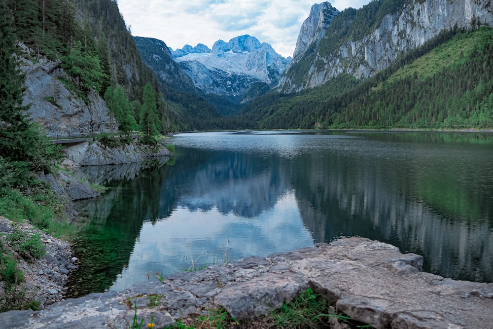 lake in the middle of mountains