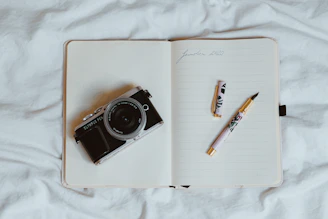 black and silver point and shoot camera