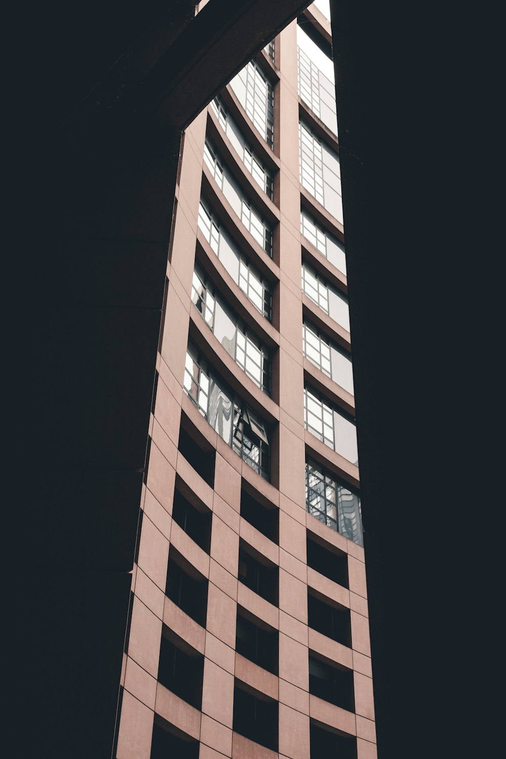 brown and white high rise building