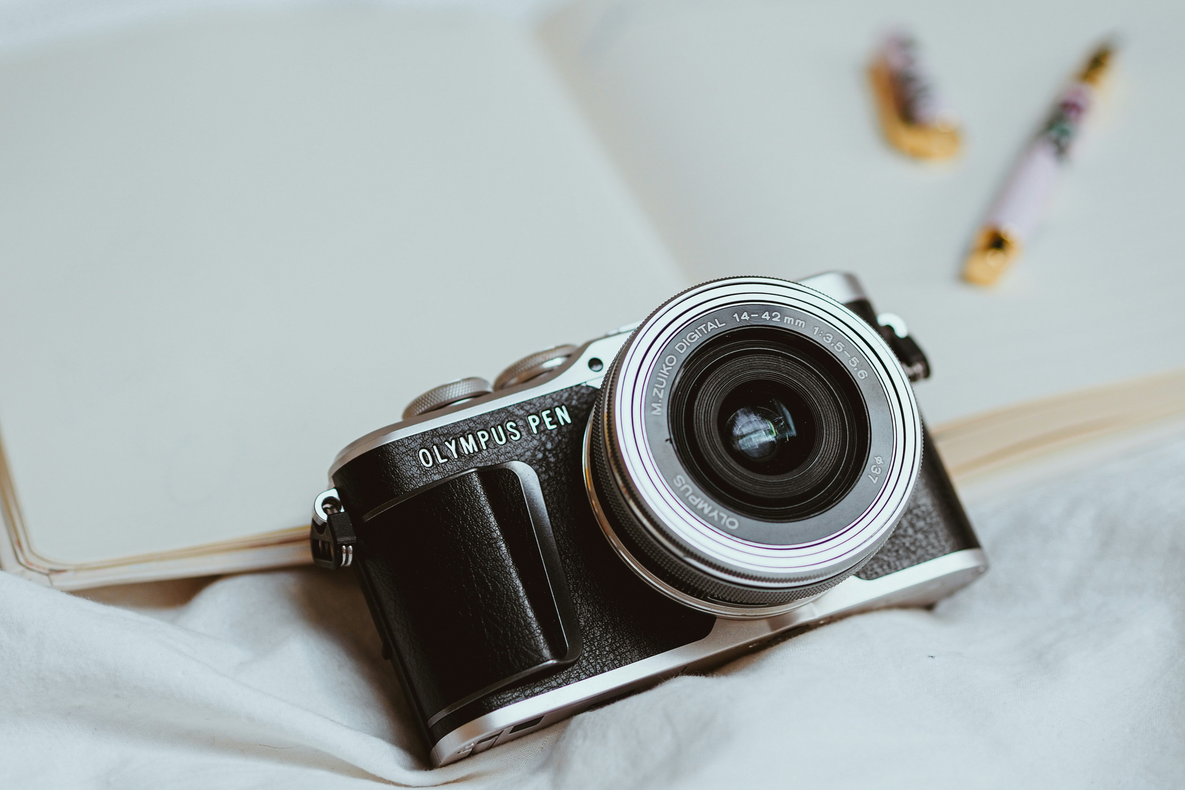 black and silver canon dslr camera