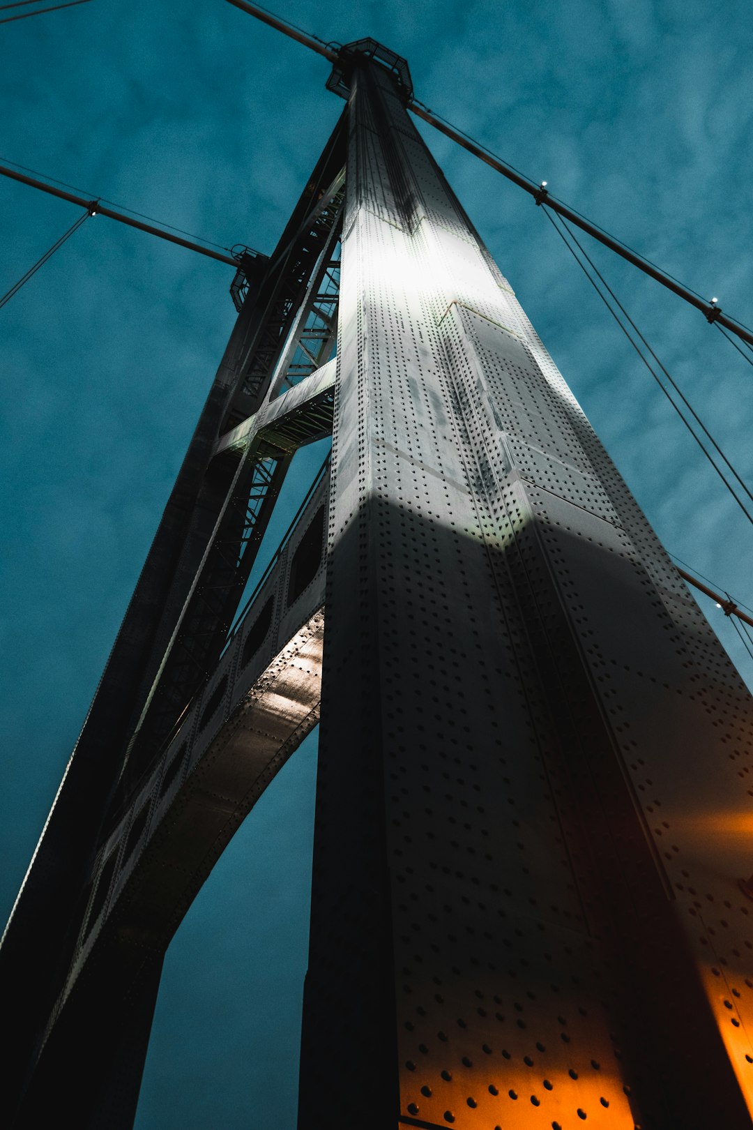 low angle photography of gray bridge