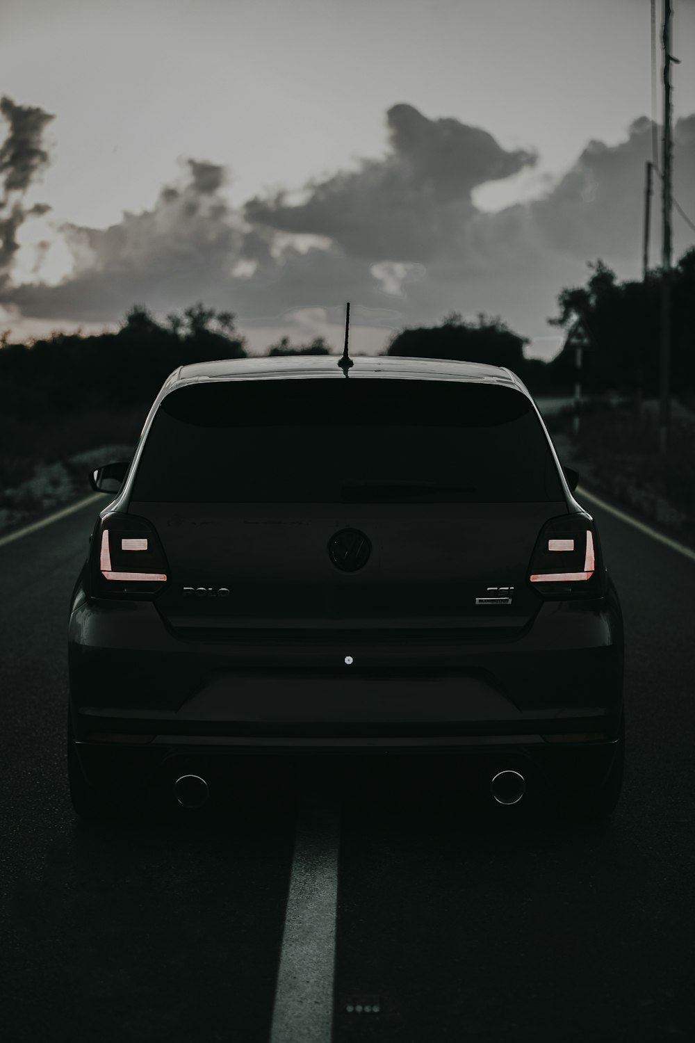 black honda car on road