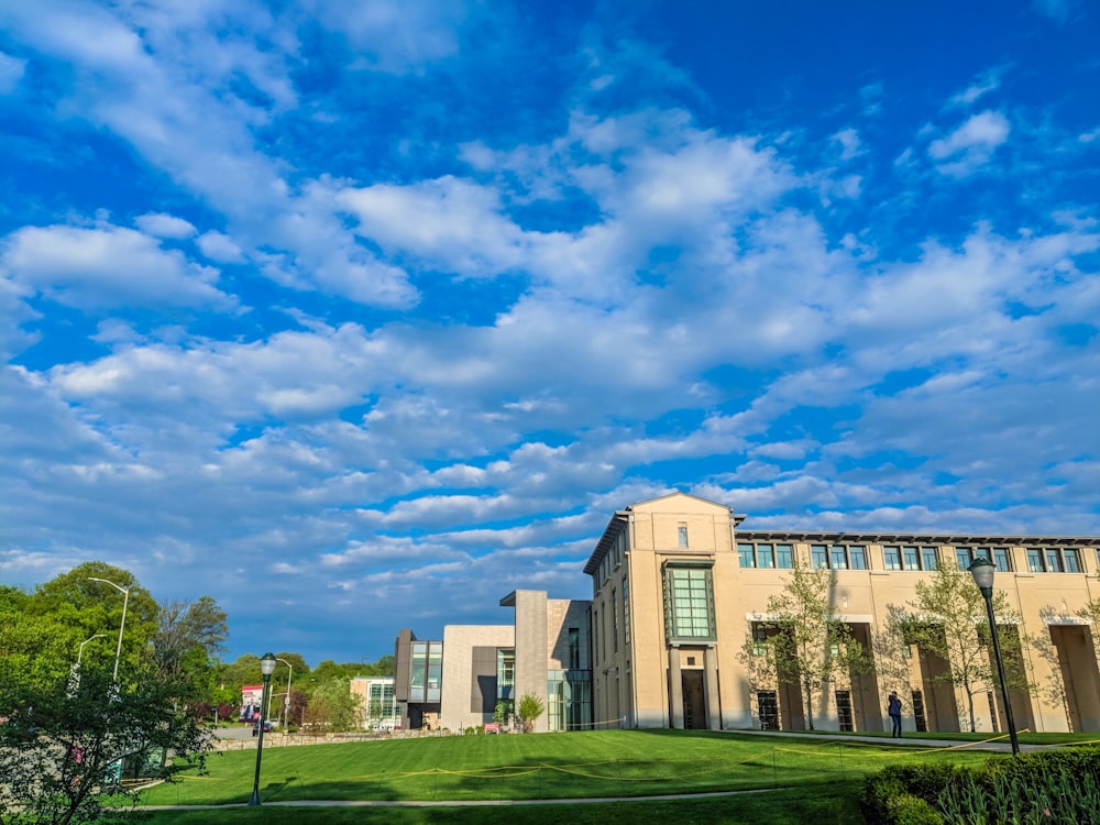 beige concrete building under blue sky during daytime