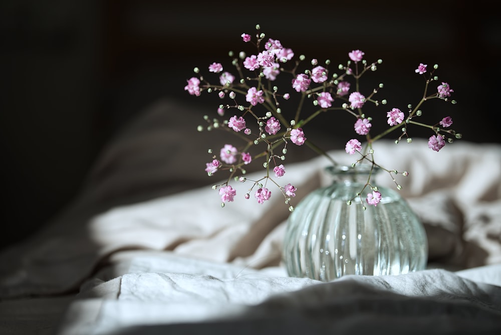 pink flowers on white textile