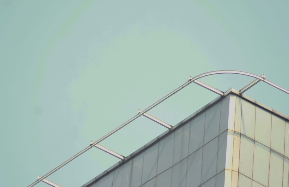 gray metal frame under blue sky during daytime