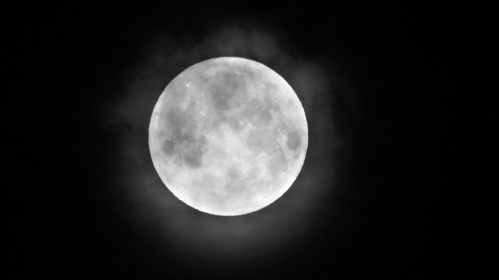 grayscale photo of full moon