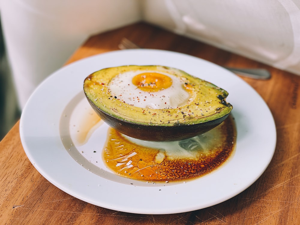 sliced avocado on white ceramic plate