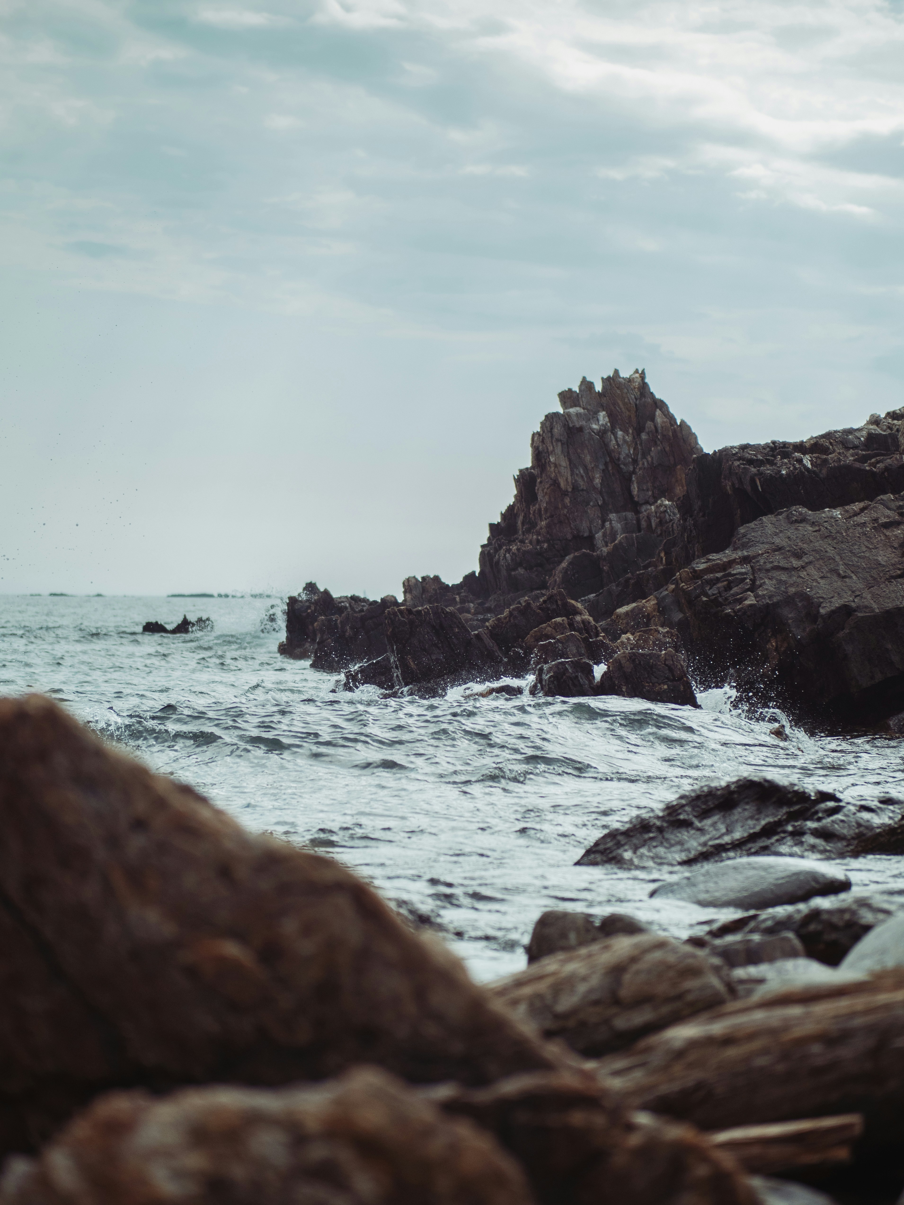 Water hits the rocky coast near the Giant's Stairs trail in Harpswell, Maine.