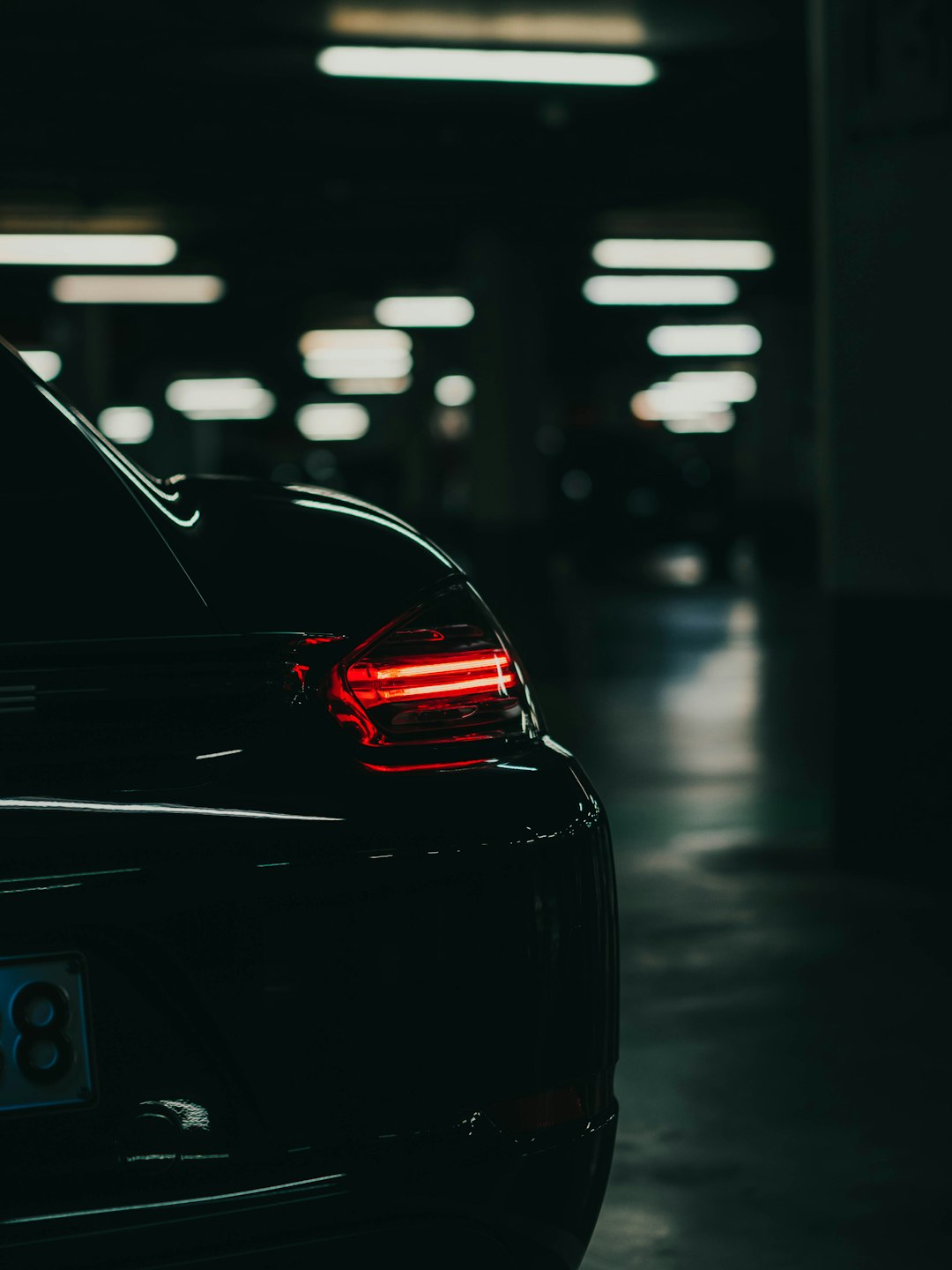 black car in a parking lot