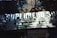 A sign with large, bold letters advertising superhero supplies. The text includes phrases like 'dastardly plots will be foiled,' 'ever vigilant, ever true,' and mentions various superhero-related items such as costumes, eyewear, and invisibility. Shadows play across the sign, adding depth to the scene.