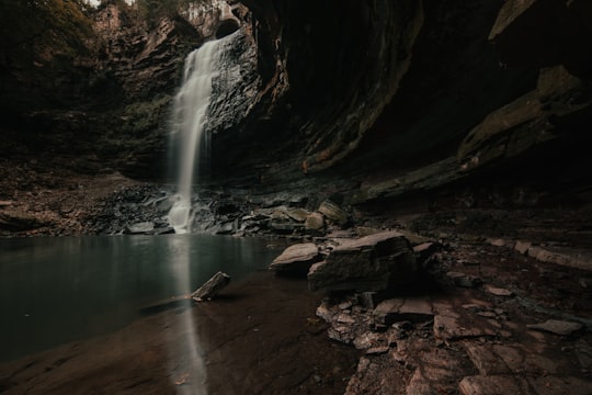 water falls in the middle of a cave in Chedoke Park Canada