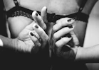grayscale photo of person holding her stomach