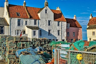Pittenweem white and brown concrete house under blue sky during daytime