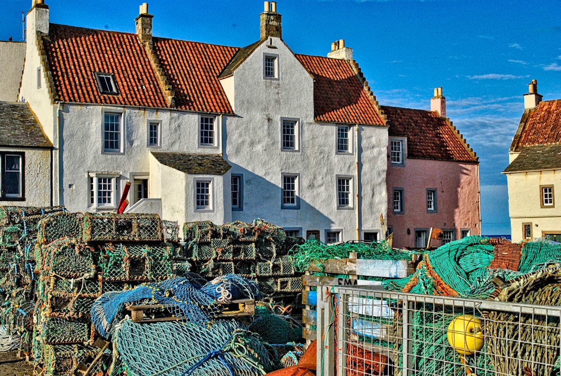 Pittenweem white and brown concrete house under blue sky during daytime