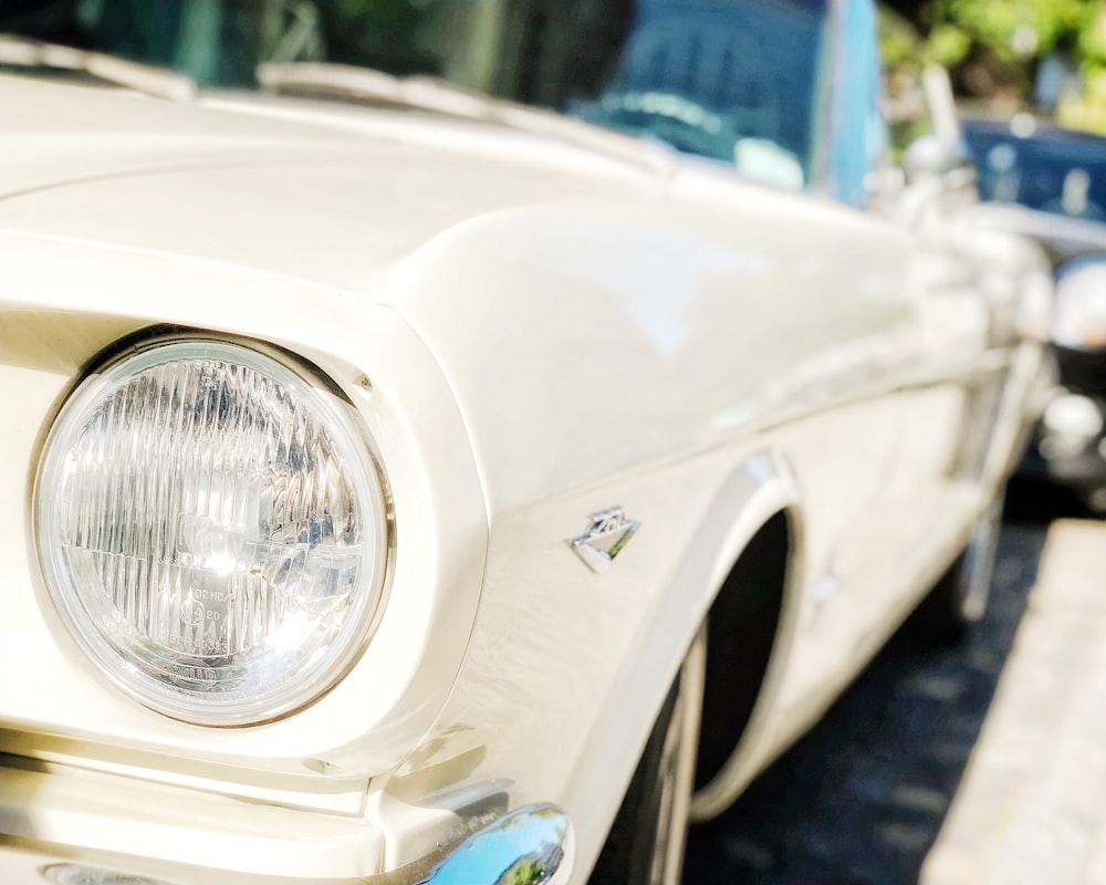 white car with silver headlight