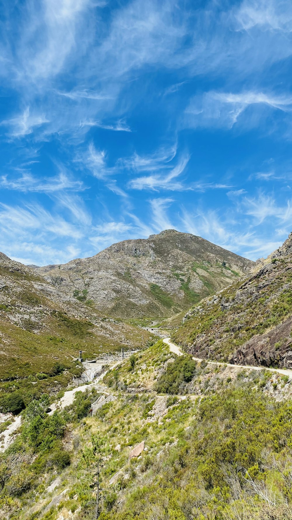 green and brown mountains under blue sky during daytime