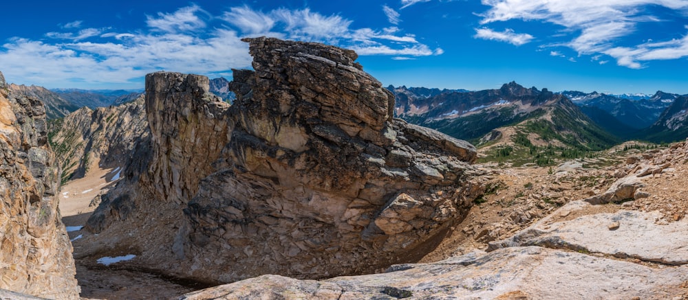 brown rocky mountain under blue sky during daytime