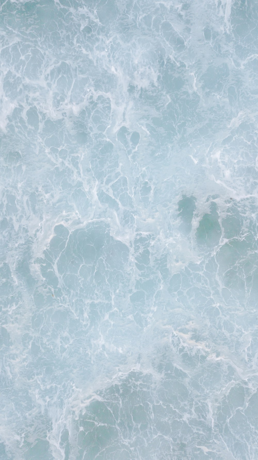 blue and white water during daytime