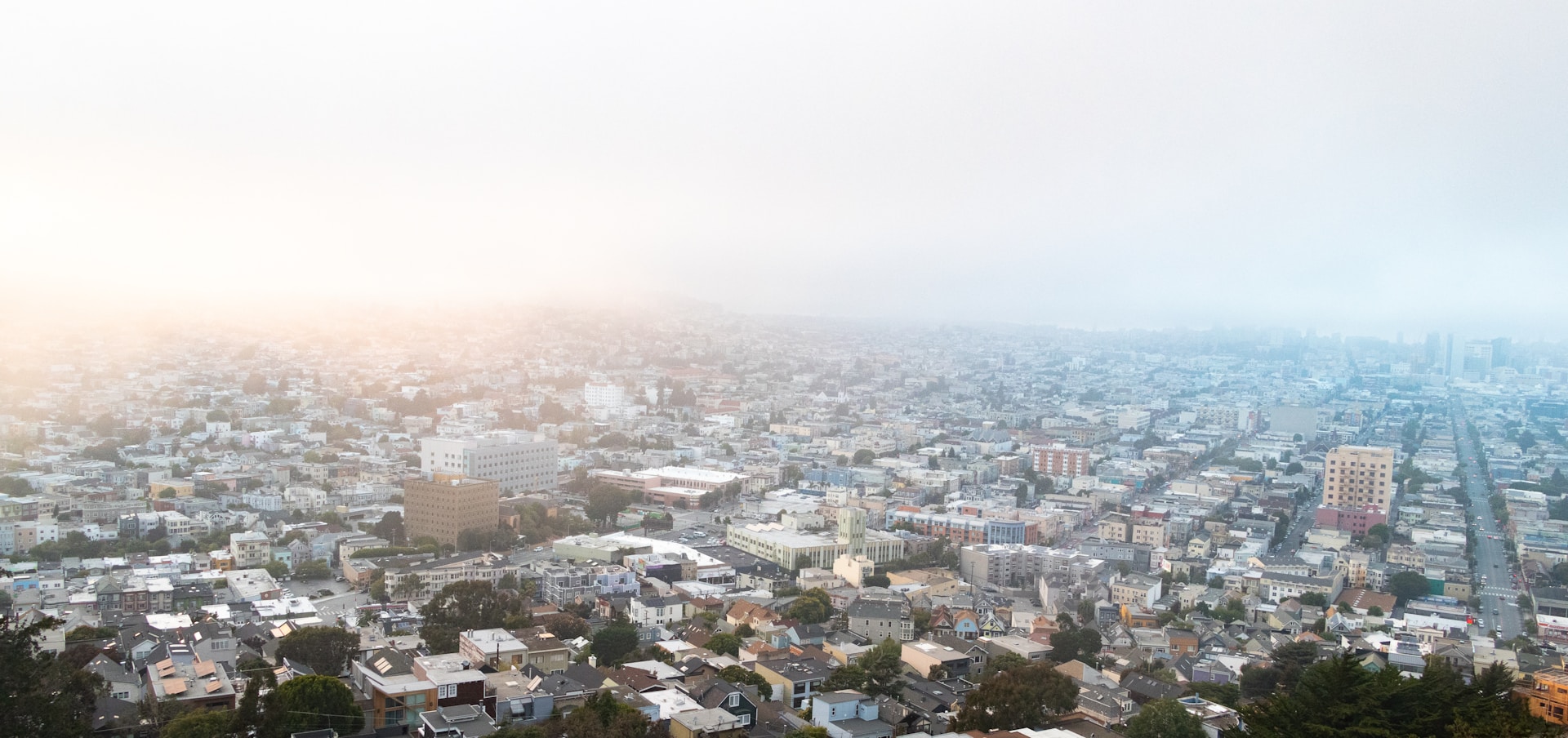 A minimalist urban landscape bathed in the soft glow of dawn.