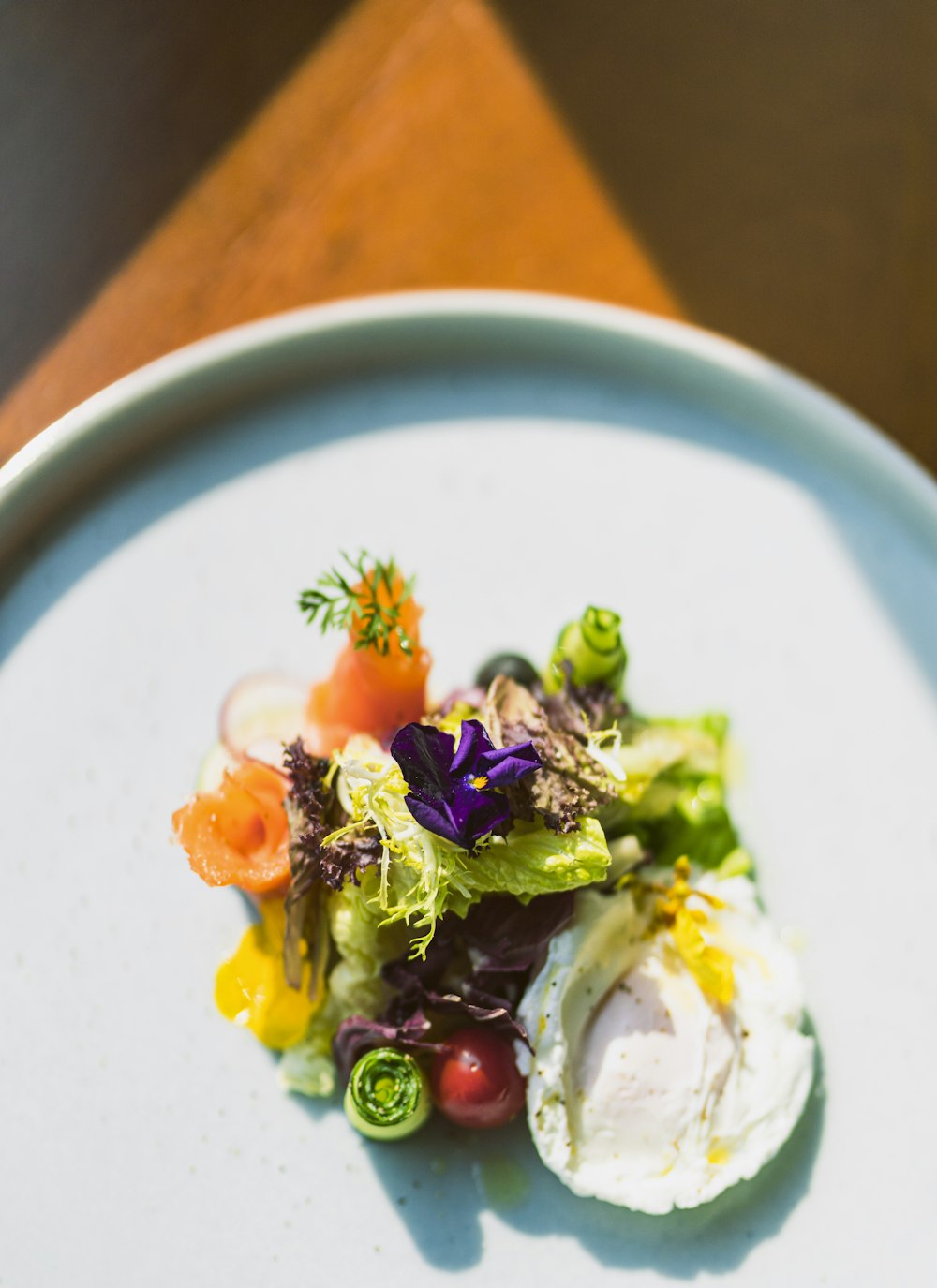 vegetable salad on white ceramic plate