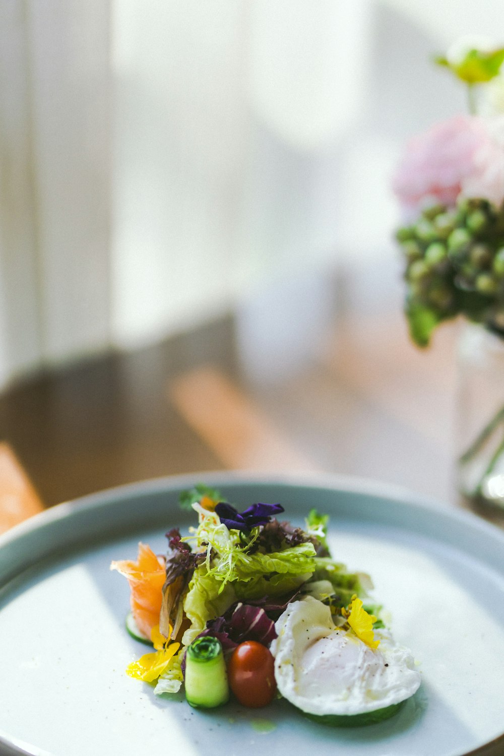 green and yellow vegetable salad on white ceramic plate