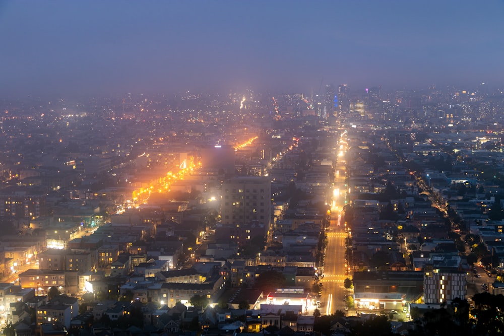 city with high rise buildings during night time