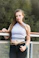 woman in white tank top and blue denim shorts