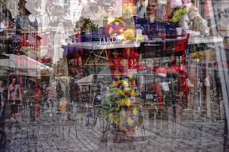 A collage of commuters walking through urban streets, blending with pixelated map layers and audio waveforms.