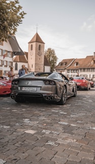 black bmw m 3 parked on street during daytime