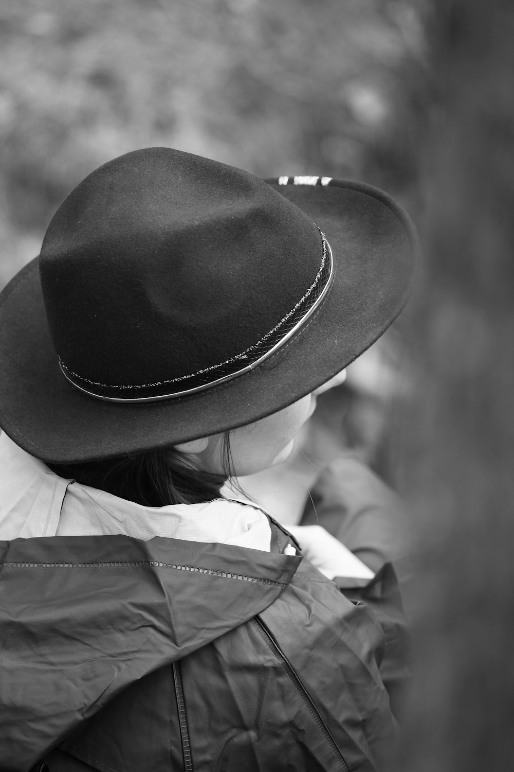 grayscale photo of woman wearing hat