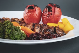 sliced fruits on white ceramic plate