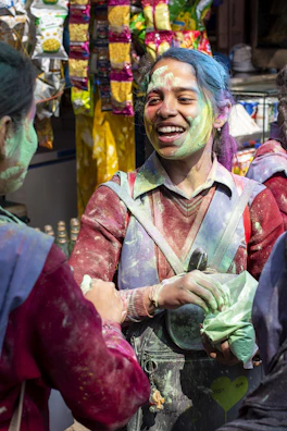 A lively moment from a Jhalmuri pop-up with colorful ingredients and smiling guests.