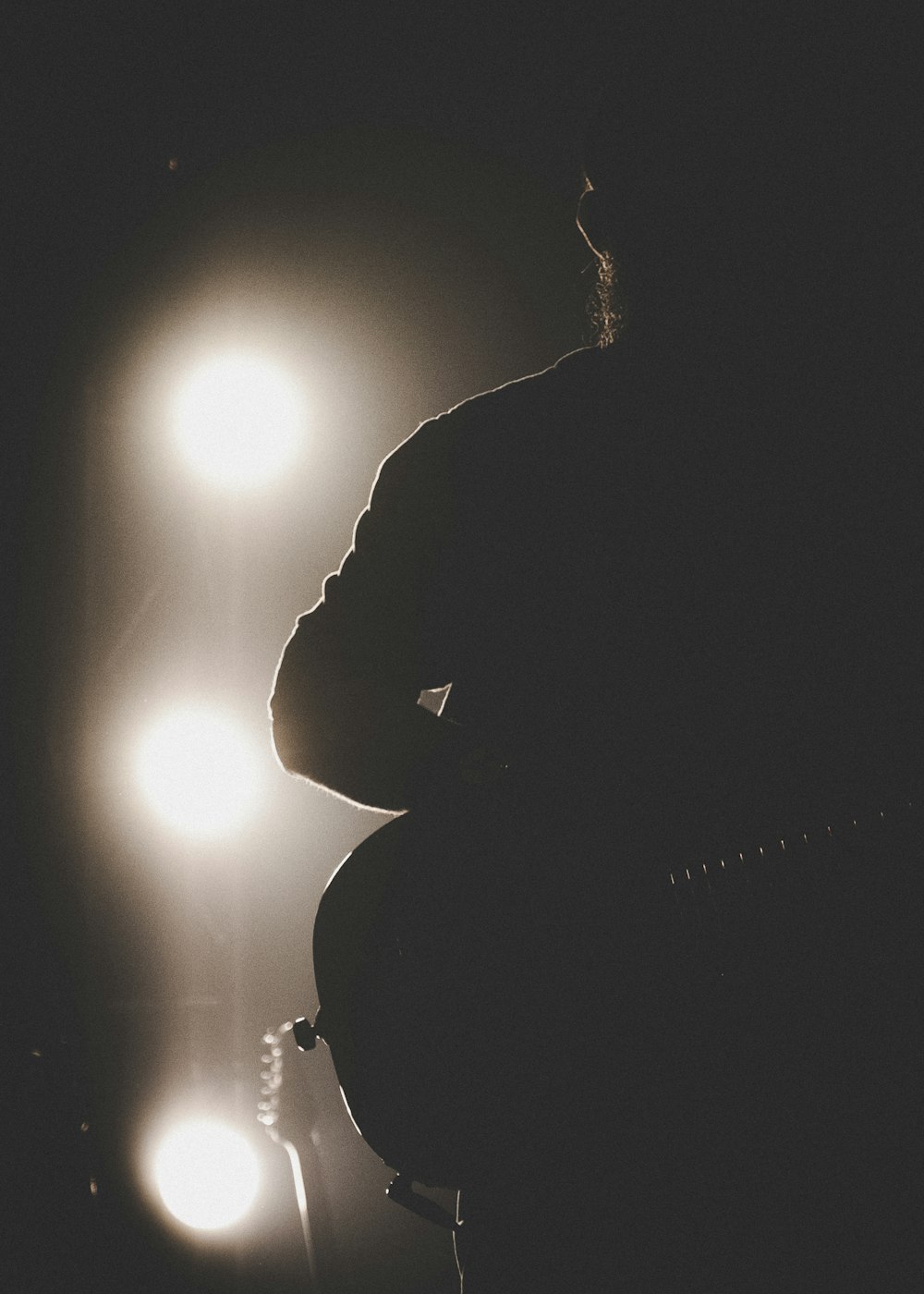 man in black jacket standing