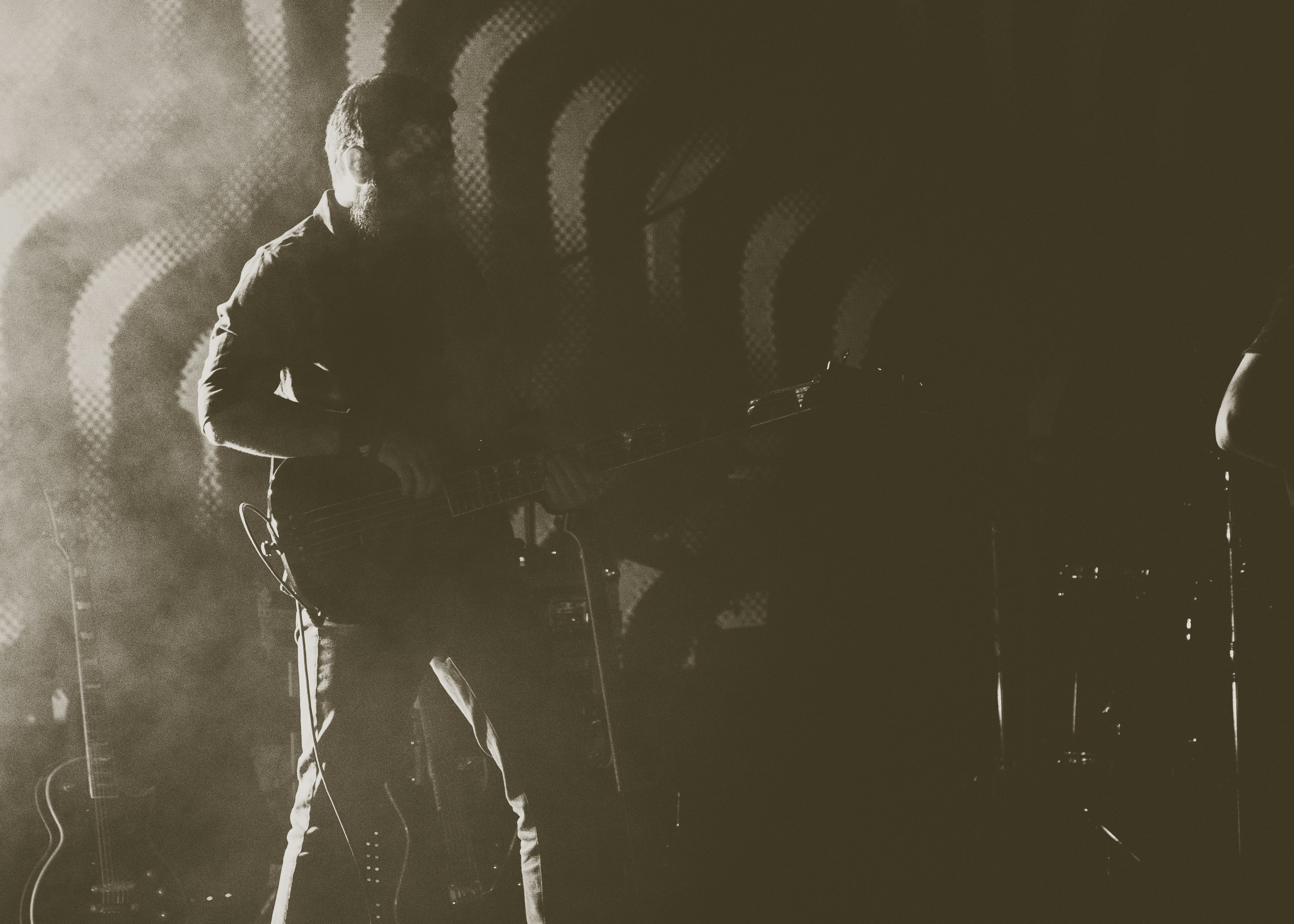 man in black and white stripe long sleeve shirt talented teams background