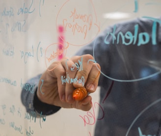 person holding orange flower petals