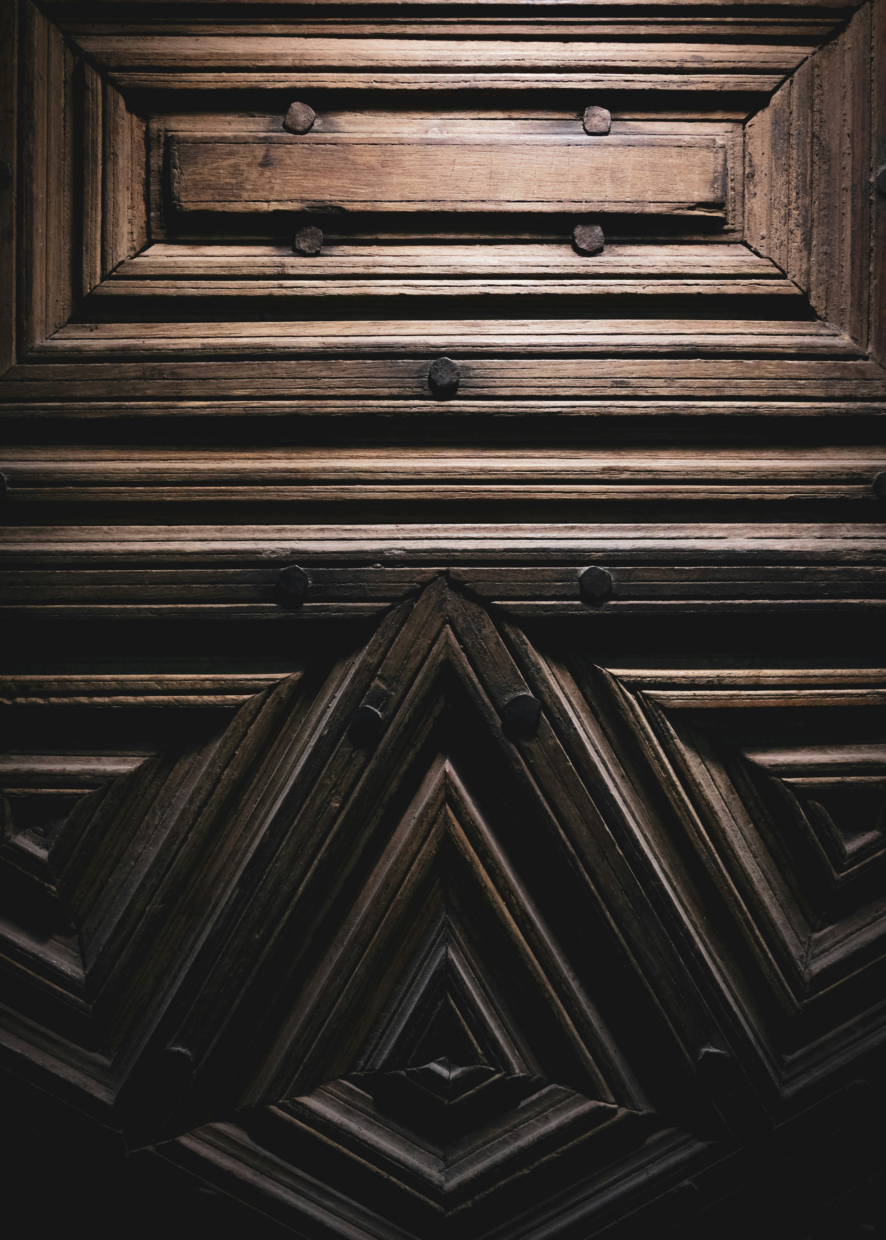 brown wooden door with white door lever