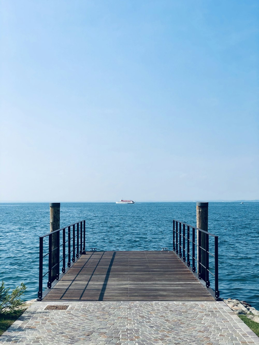 brown wooden dock on sea during daytime