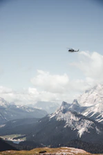 A helicopter soaring over the stunning landscapes of the Grand Canyon.