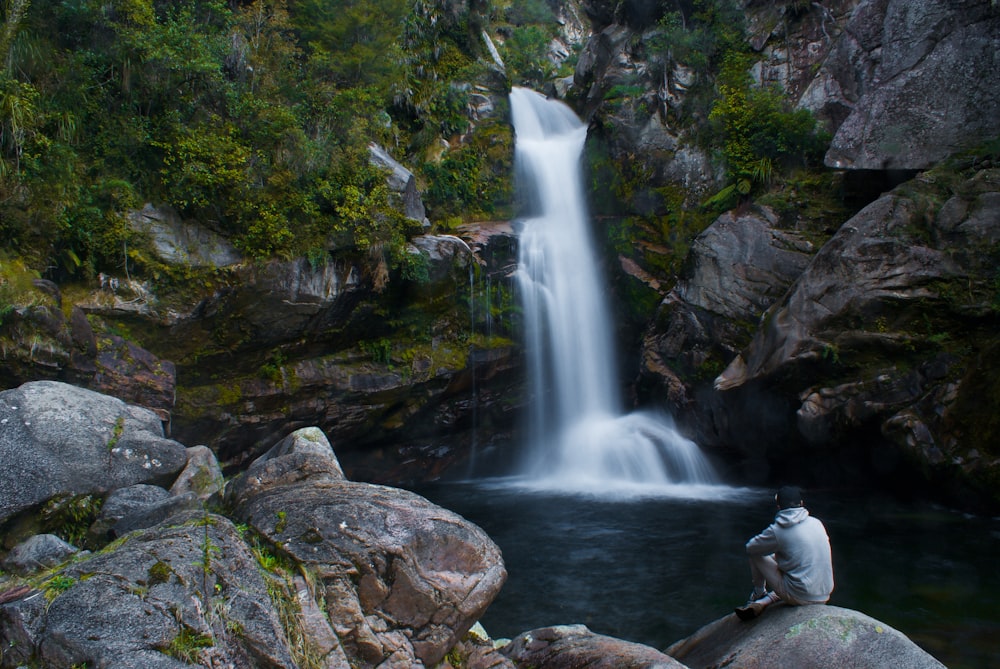 waterfalls in the middle of the forest