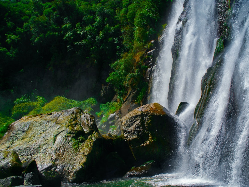 water falls on rocky mountain