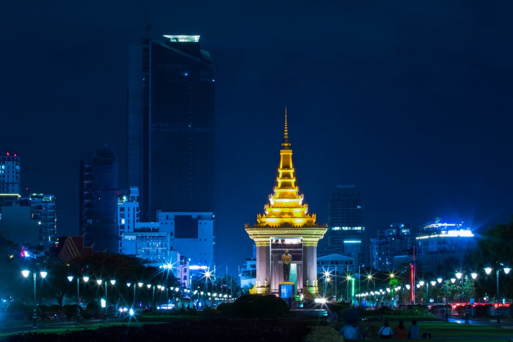 white and gold concrete building during night time