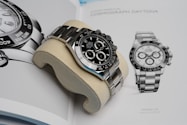 silver and black chronograph watch