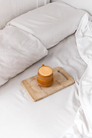 Stylized icon of a cozy bed next to the card title.