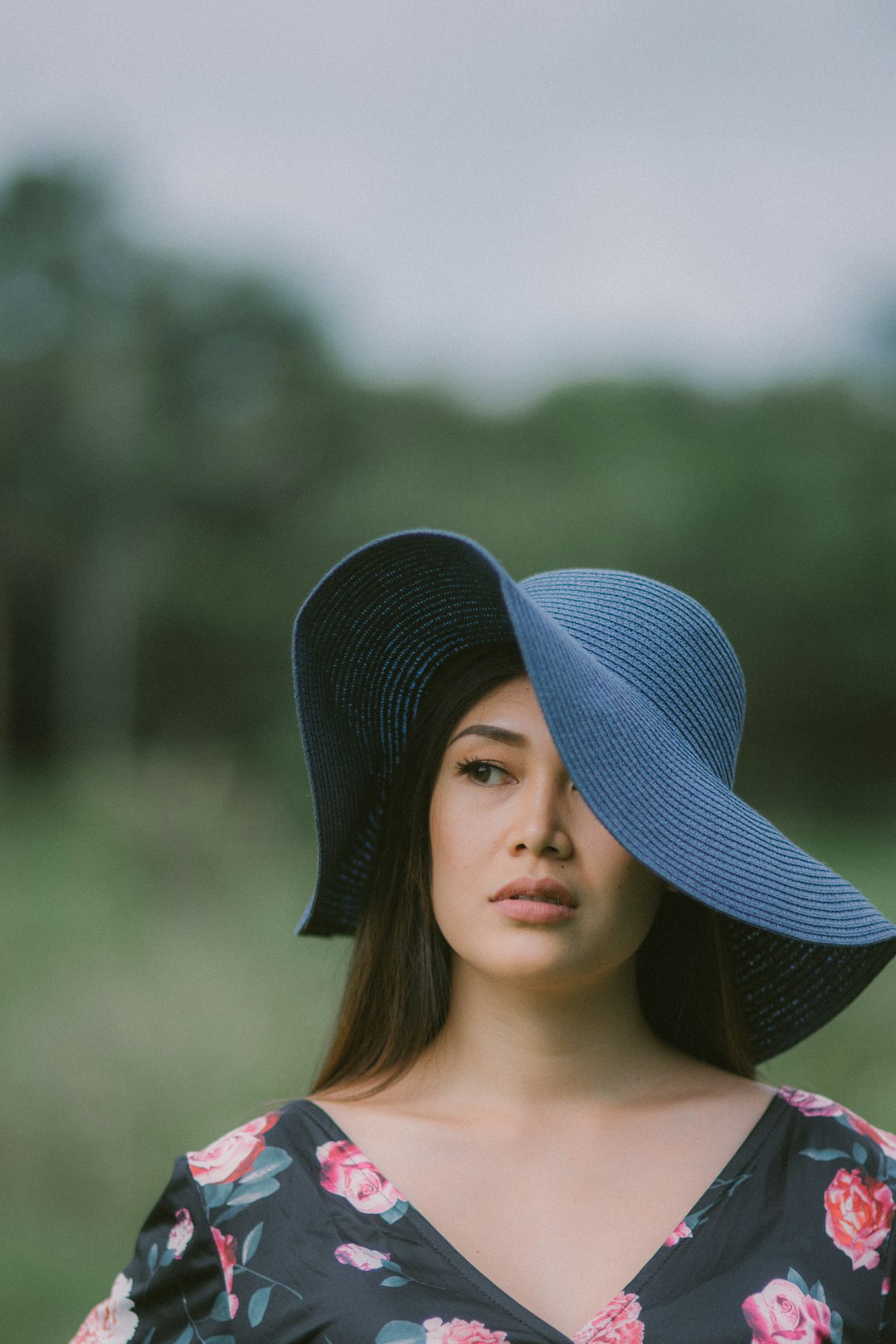 woman in blue hat during daytime