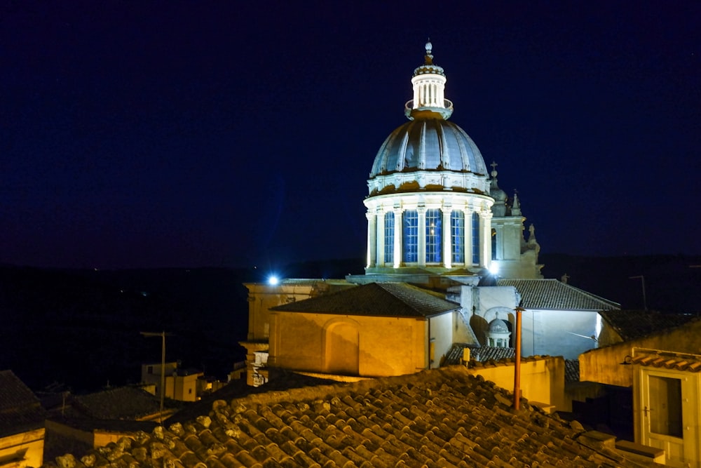 white concrete dome building during night time