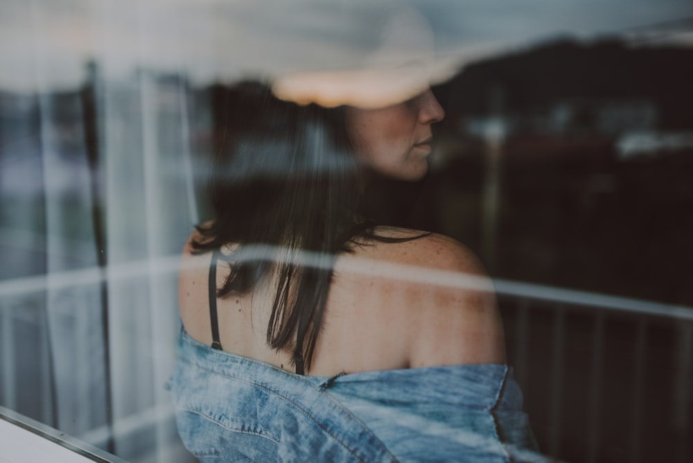 woman in blue denim jeans