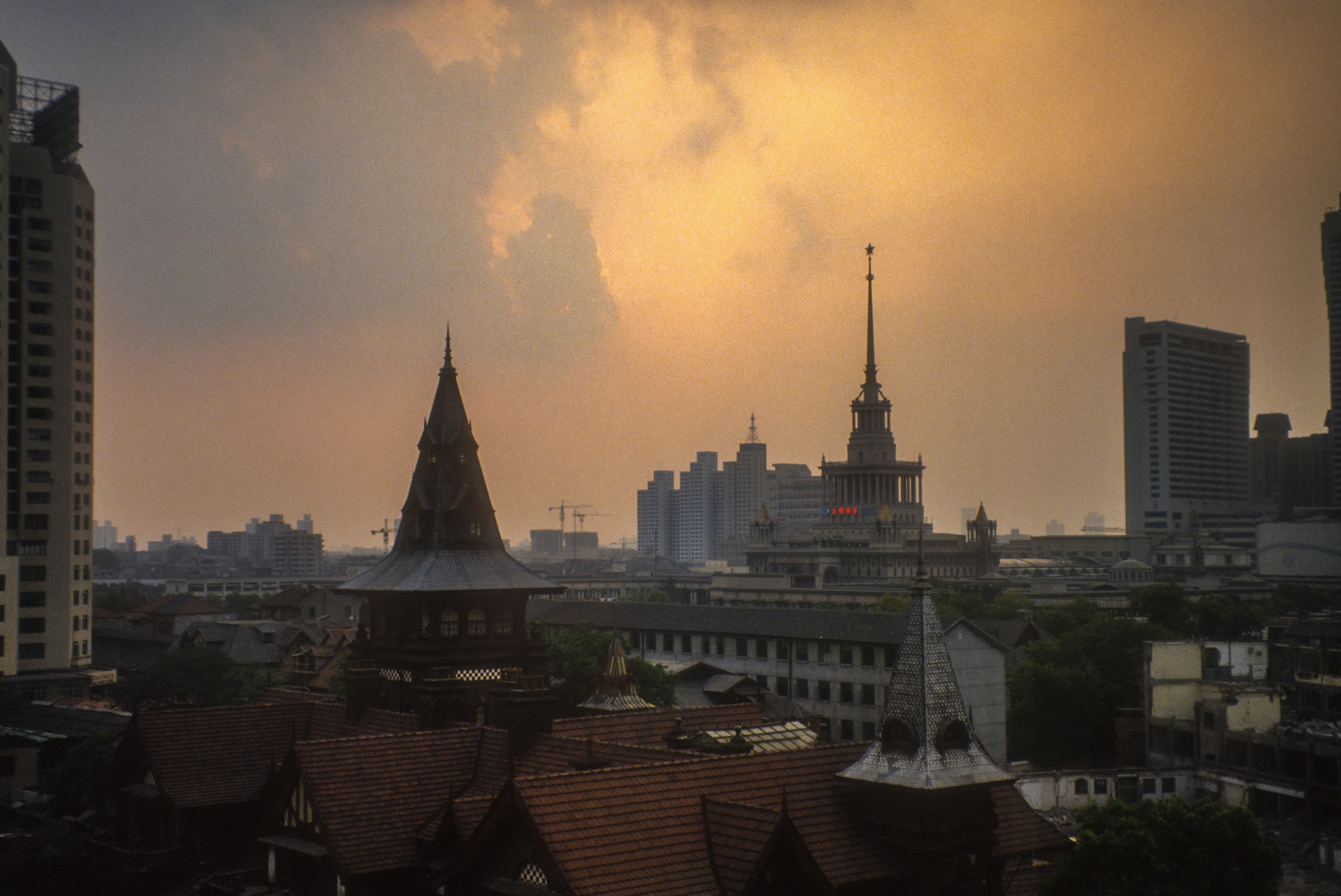 Shanghai late afternoon after a thunderstorm. || shot on slide film, 1992, scanned on Nikon CoolScan 4000.