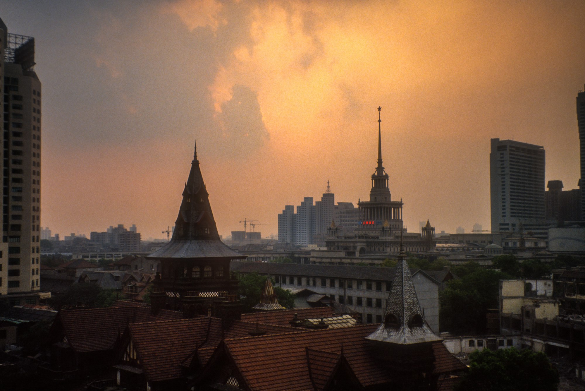 Shanghai late afternoon after a thunderstorm. || shot on slide film, 1992, scanned on Nikon CoolScan 4000.
