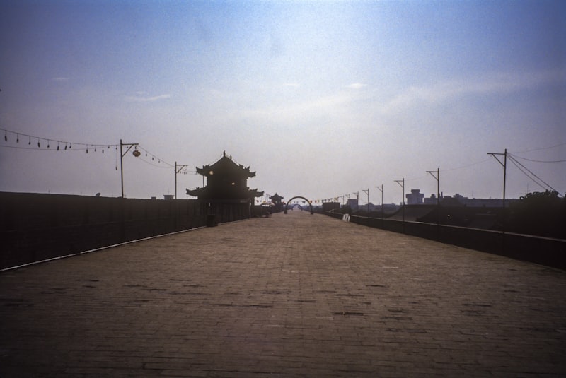 Autumn Ancient Xi'an alley with persimmon trees and few tourists