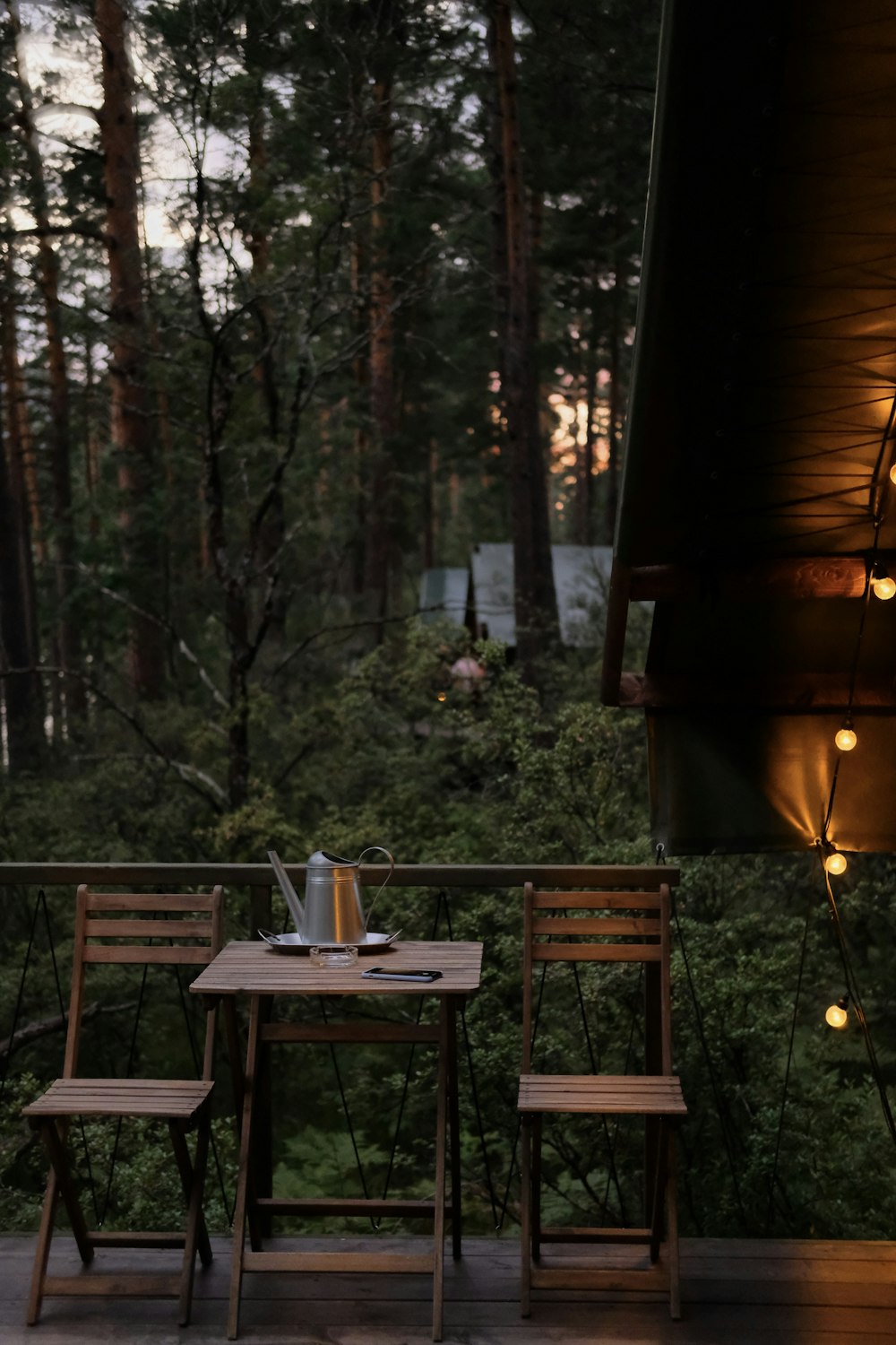 brown wooden table with chairs